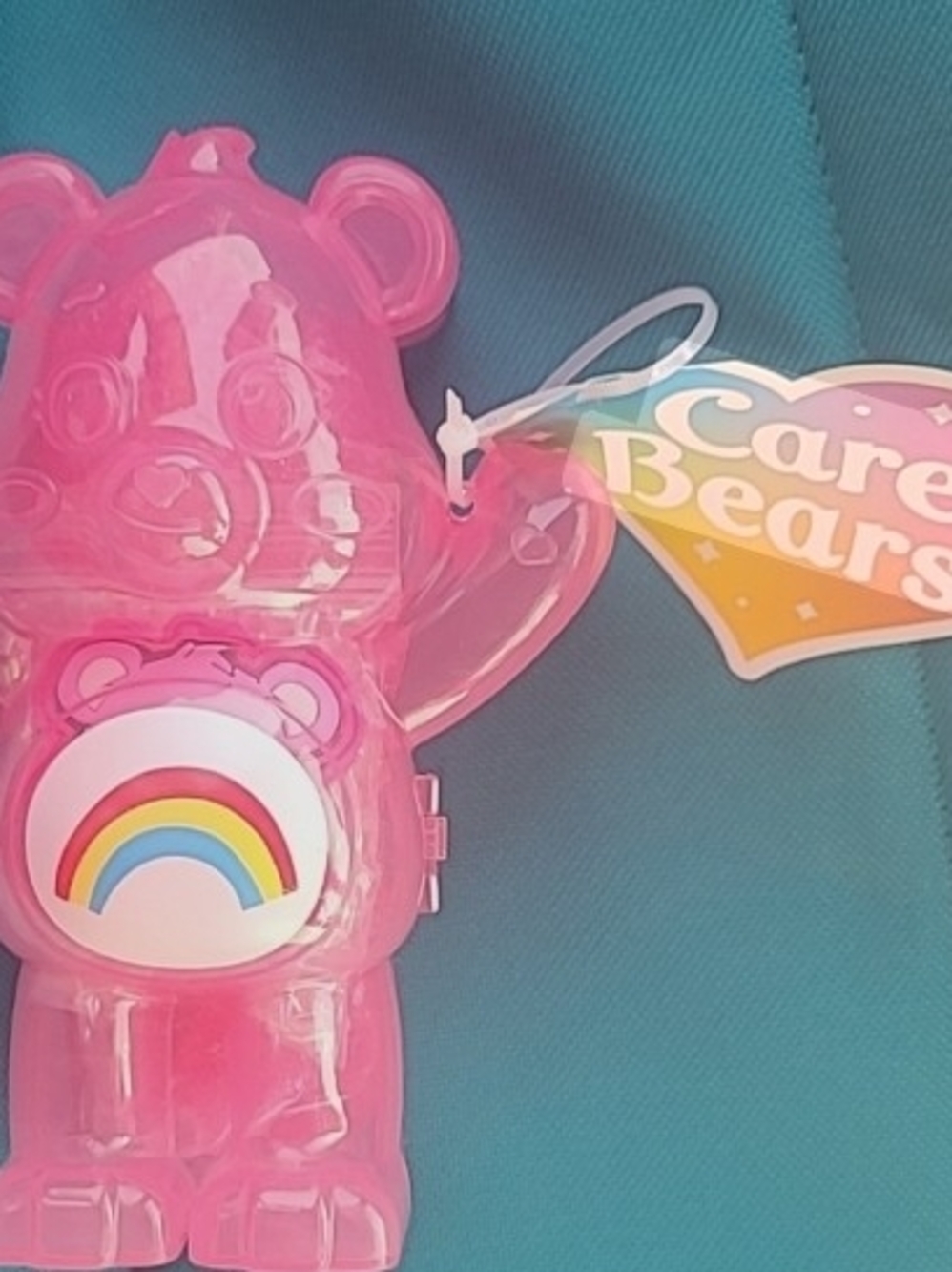 Care Bears Glitter Slime container 5 Oz. Featuring Cheer Bear.